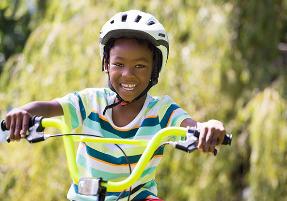 Young boy riding bike