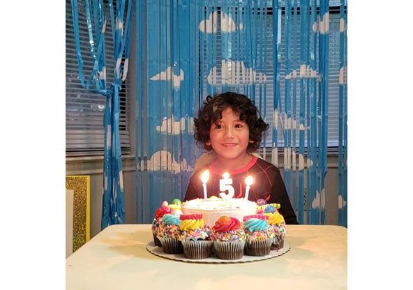 Tristan with his 5th birthday cake