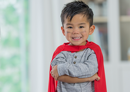 A child smiling from a hospital